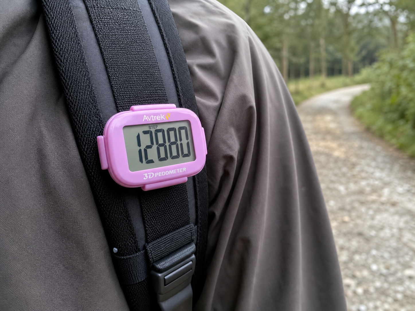 Man carrying an AVTREK 2204 clip-on pedometer on a California boardwalk